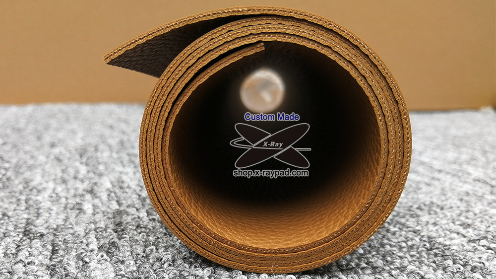 https://shop.x-raypad.com/wp-content/uploads/2018/03/custom-leather-desk-pad-edges-showing-in-roll-packing-medium.jpg